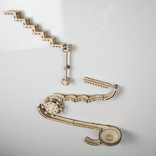 Load image into Gallery viewer, ~n example marble run made using the Infinity Trax starter pack